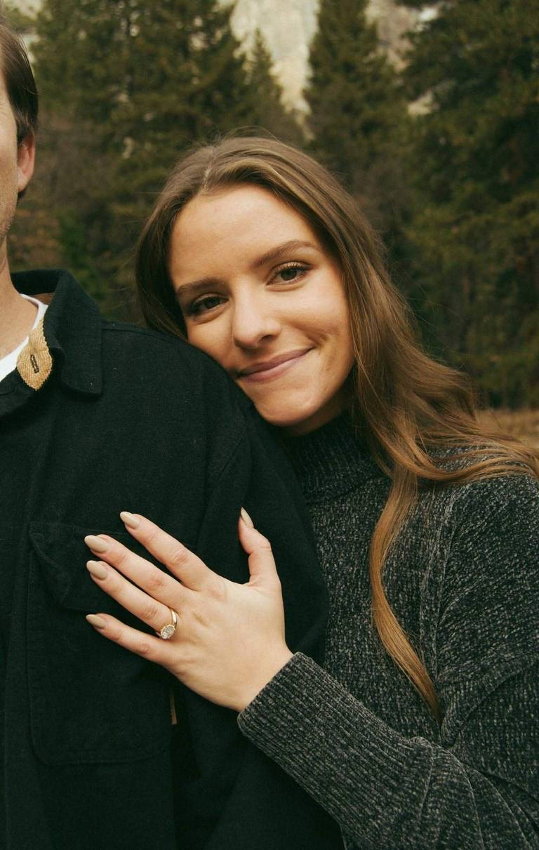 Engagement couple with mountain backdrop
