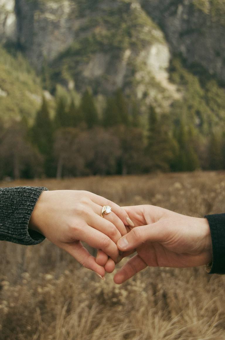 Engagement portrait of couple embracing